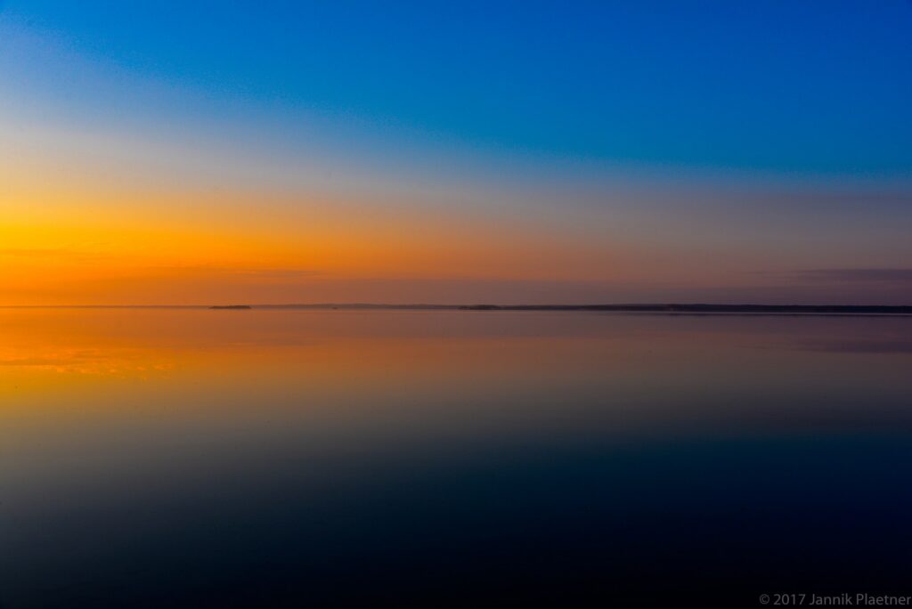 Blue and orange twilight reflected on Hanging Heart Lakes